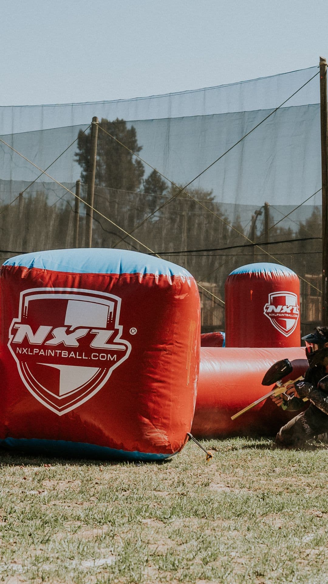 Player kneeling behind cover during a match